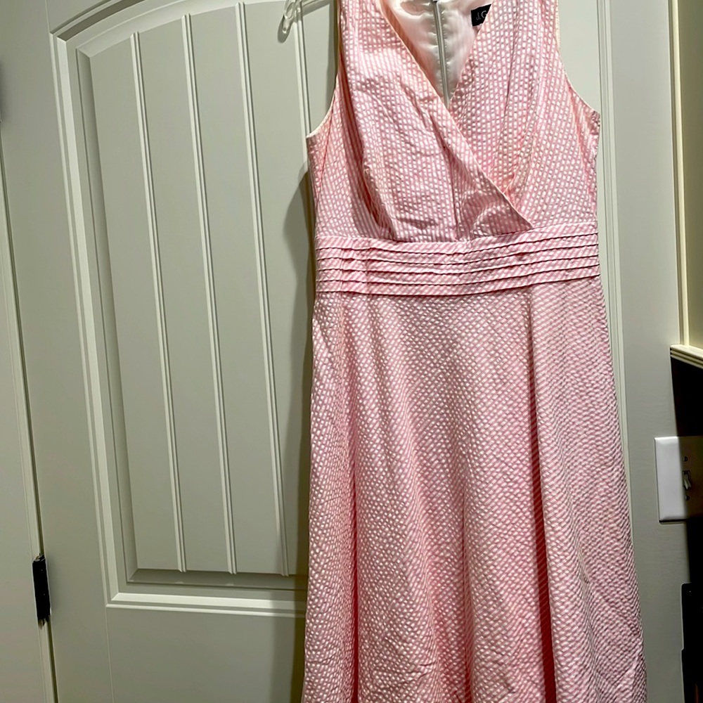 Pastel pink and white-striped seersucker, fully lined.SO FLATTERING!